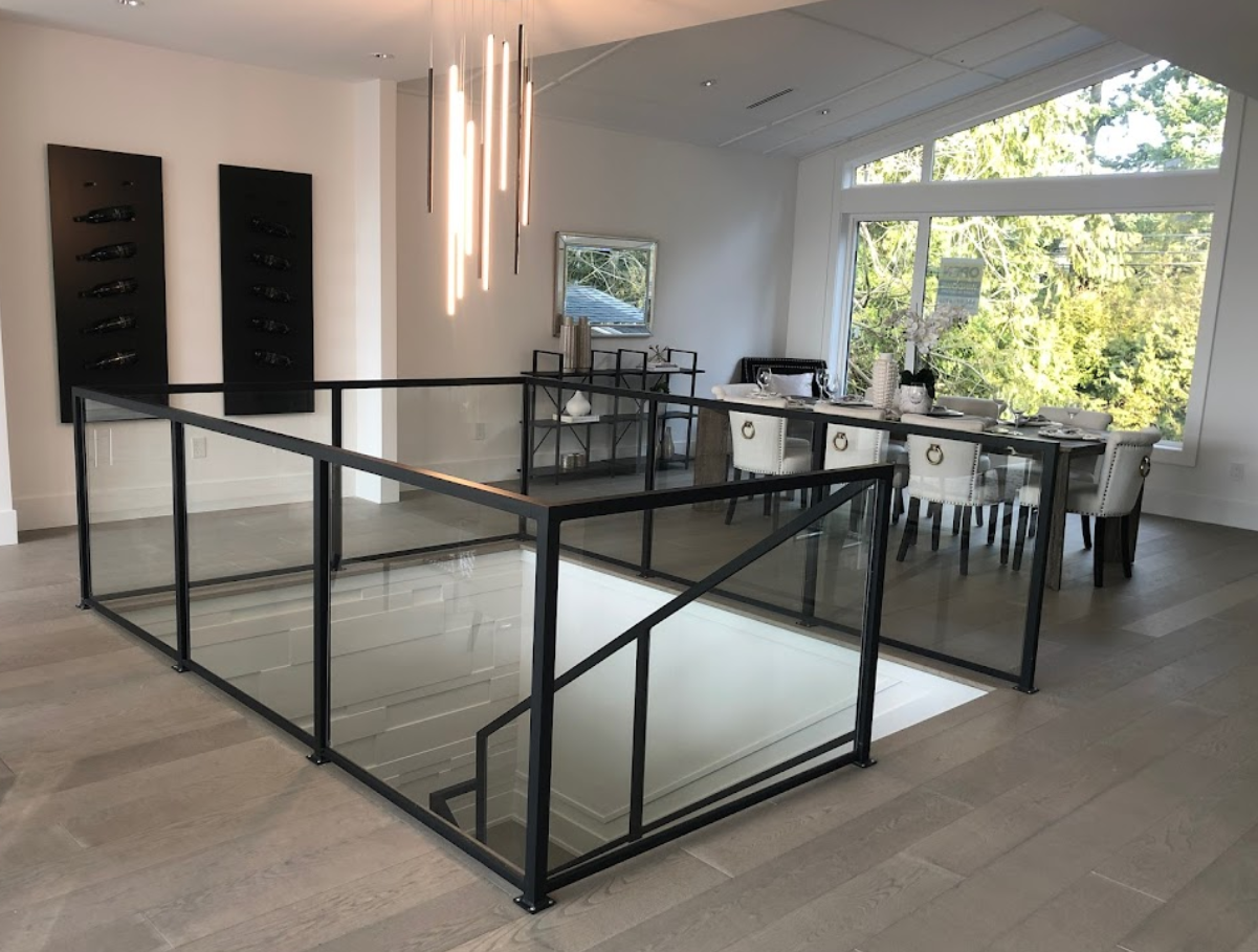 modern interior metal railing with glass