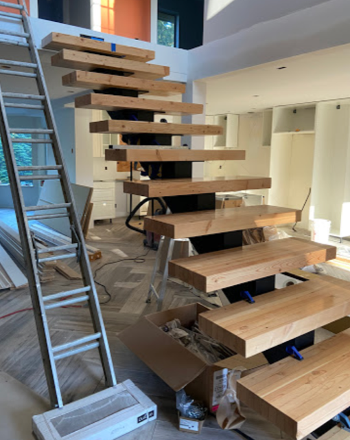 floating metal stair stringer with wood treads